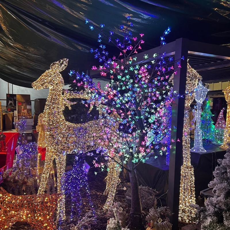 colourful outdoor christmas trees and rheindeer